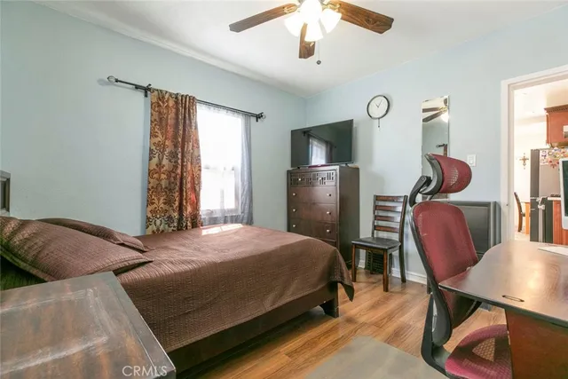 a view of a patio with table and chairs and potted plants