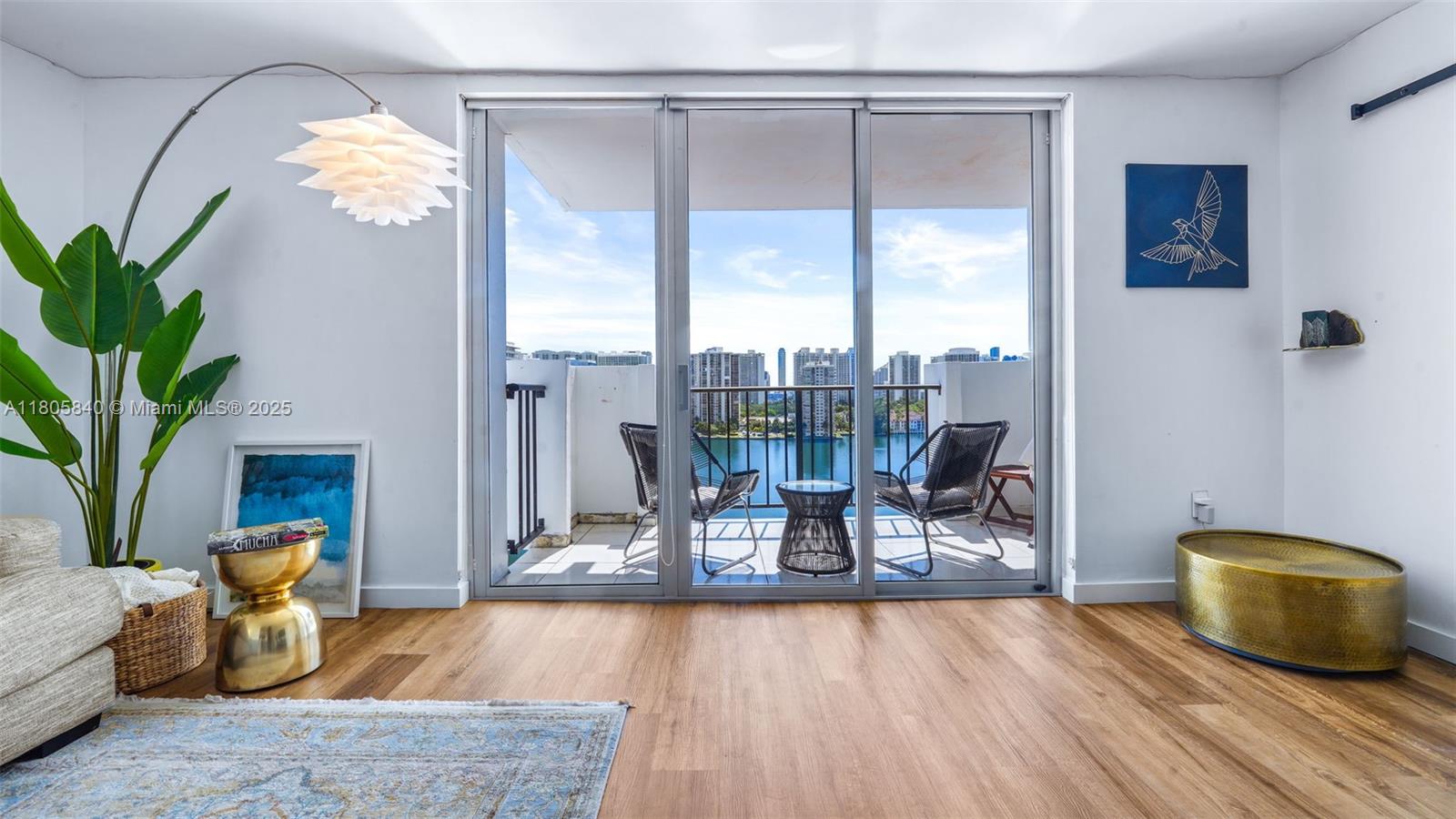 a dining room with wooden floor and a table chair