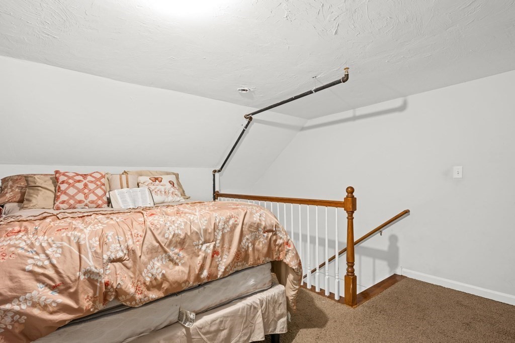 7 South Maxwell Court Worcester, MA 01607 - Photo 15 of 19 a bedroom with a bed and a window