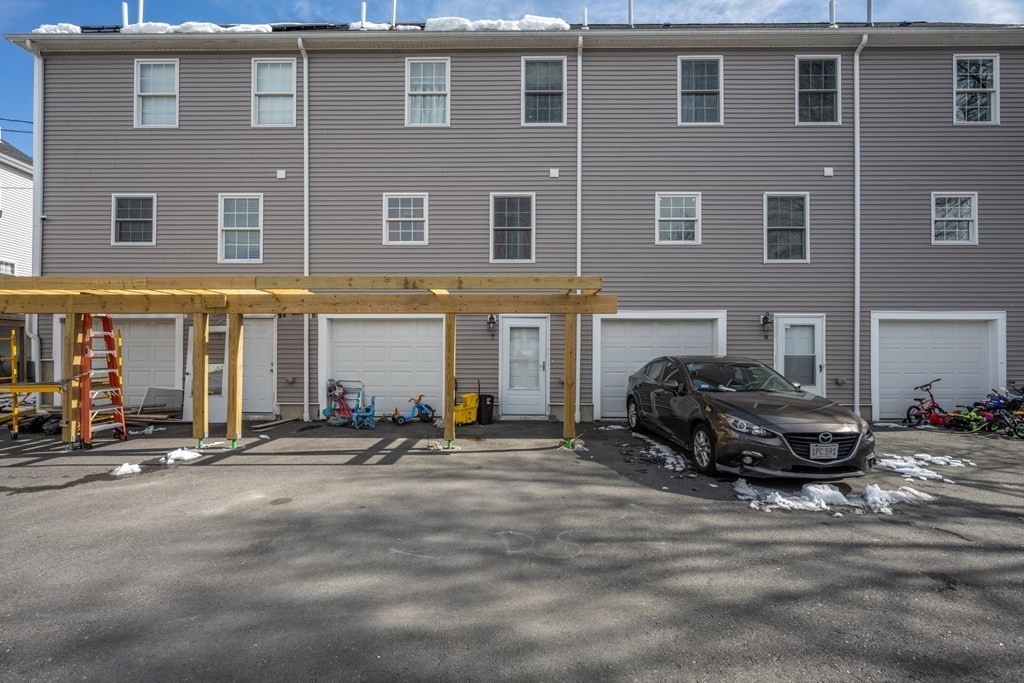 7 South Maxwell Court Worcester, MA 01607 - Photo 17 of 19 a car parked in front of a building