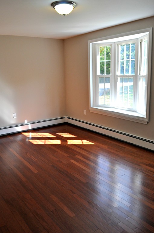 400 North Brookfield Road Barre, MA 01005 - Photo 3 of 25 a view of a room with wooden floor and a window