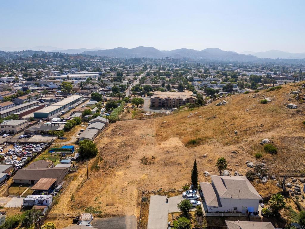 1161 North Anza Street El Cajon, CA 92021 - Photo 17 of 32 an aerial view of residential house and sandy dunes