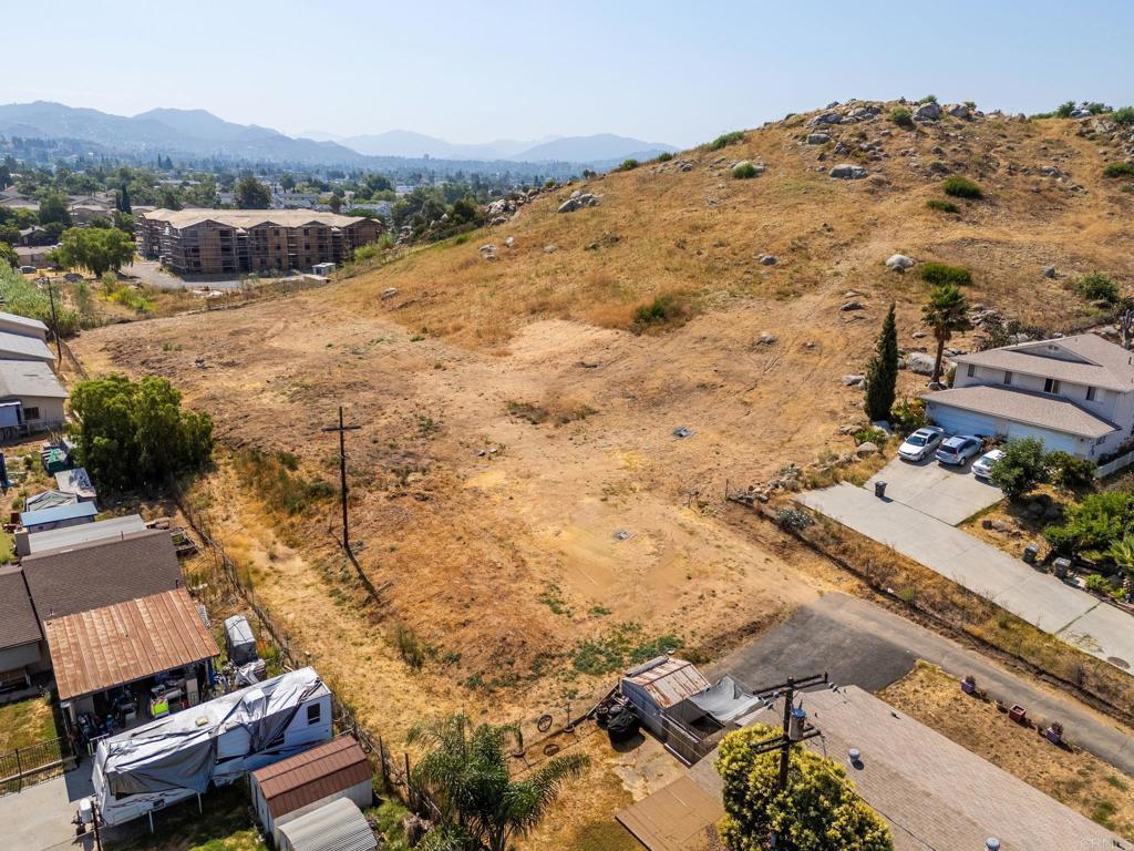 1161 North Anza Street El Cajon, CA 92021 - Photo 19 of 32 an aerial view of residential houses with outdoor space