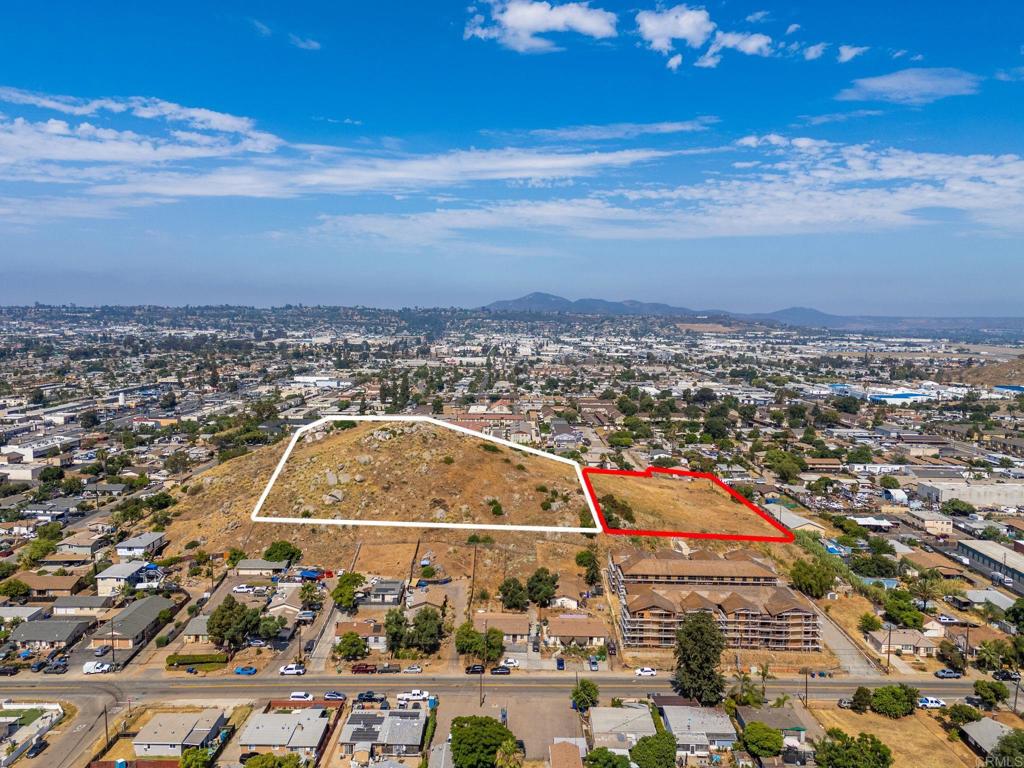 1161 North Anza Street El Cajon, CA 92021 - Photo 22 of 32 an aerial view of residential houses with outdoor space