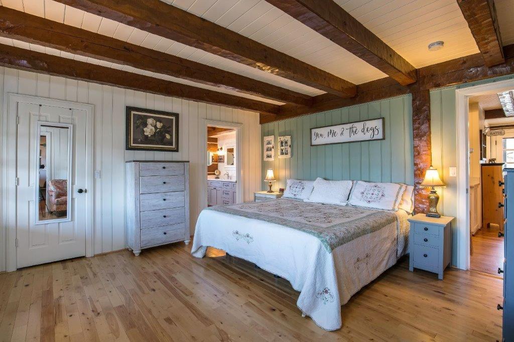 10572 Fleming Road Powell Butte, OR 97753 - Photo 11 of 54 Primary bedroom on the main floor