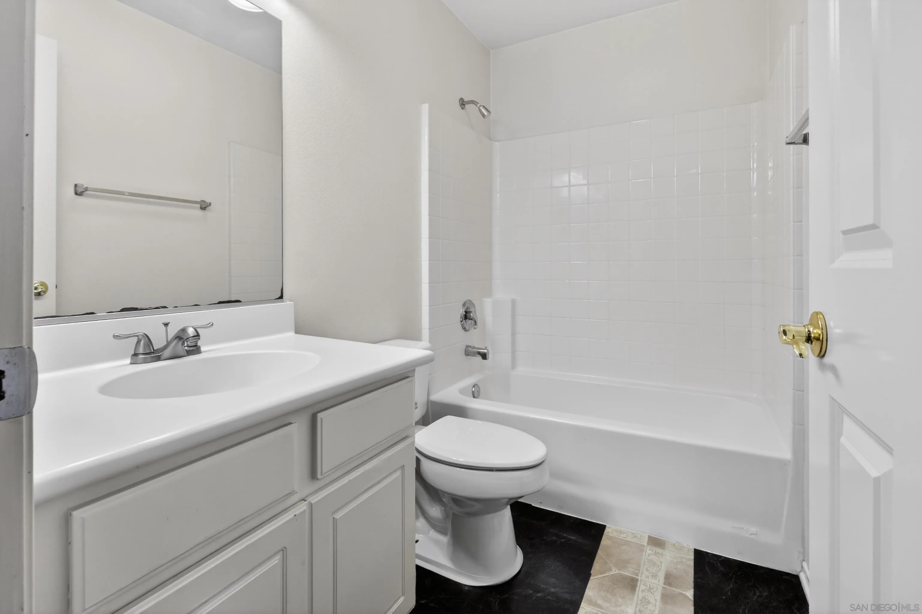 1432 Belmont Park Road Oceanside, CA 92057 - Photo 53 of 54 a bathroom with a sink toilet and shower