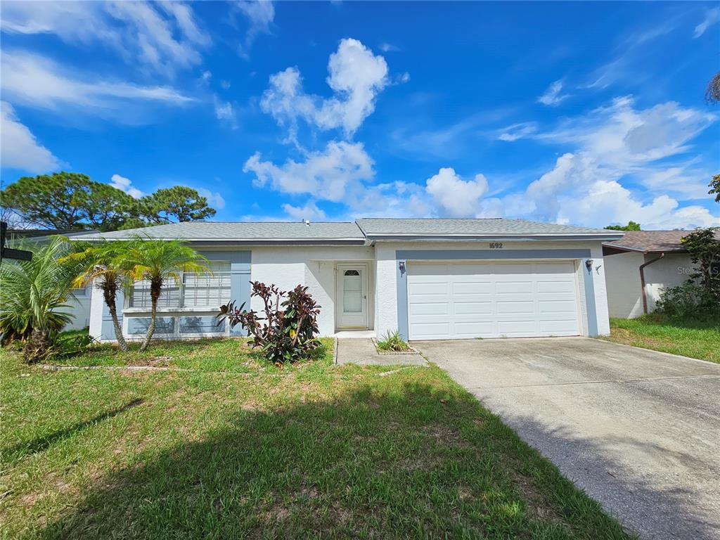 1692 East Grovehill Road Palm Harbor, FL 34683 - Photo 1 of 1