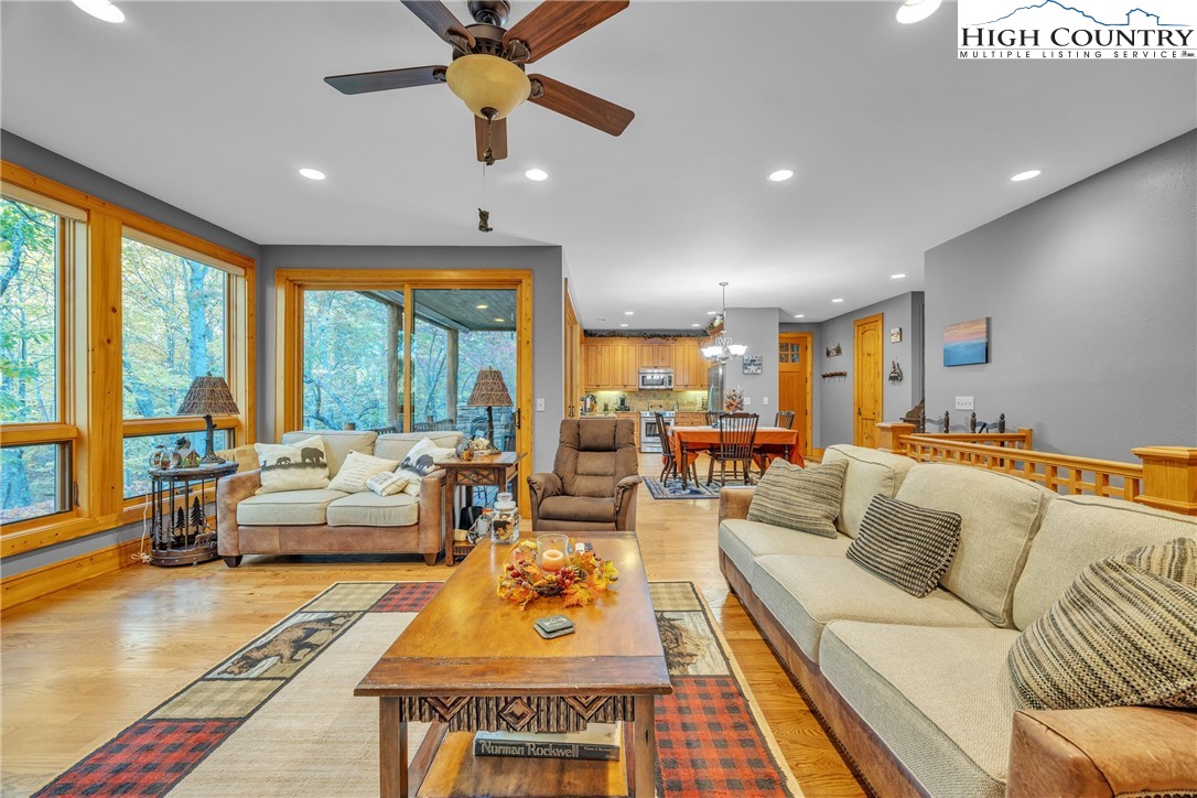 89 Springhouse Drive, Unit A4 Elk Park, NC 28622 - Photo 17 of 46 a living room with furniture and a large window