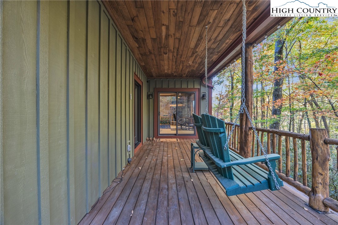 89 Springhouse Drive, Unit A4 Elk Park, NC 28622 - Photo 34 of 46 a view of outdoor space with deck and furniture
