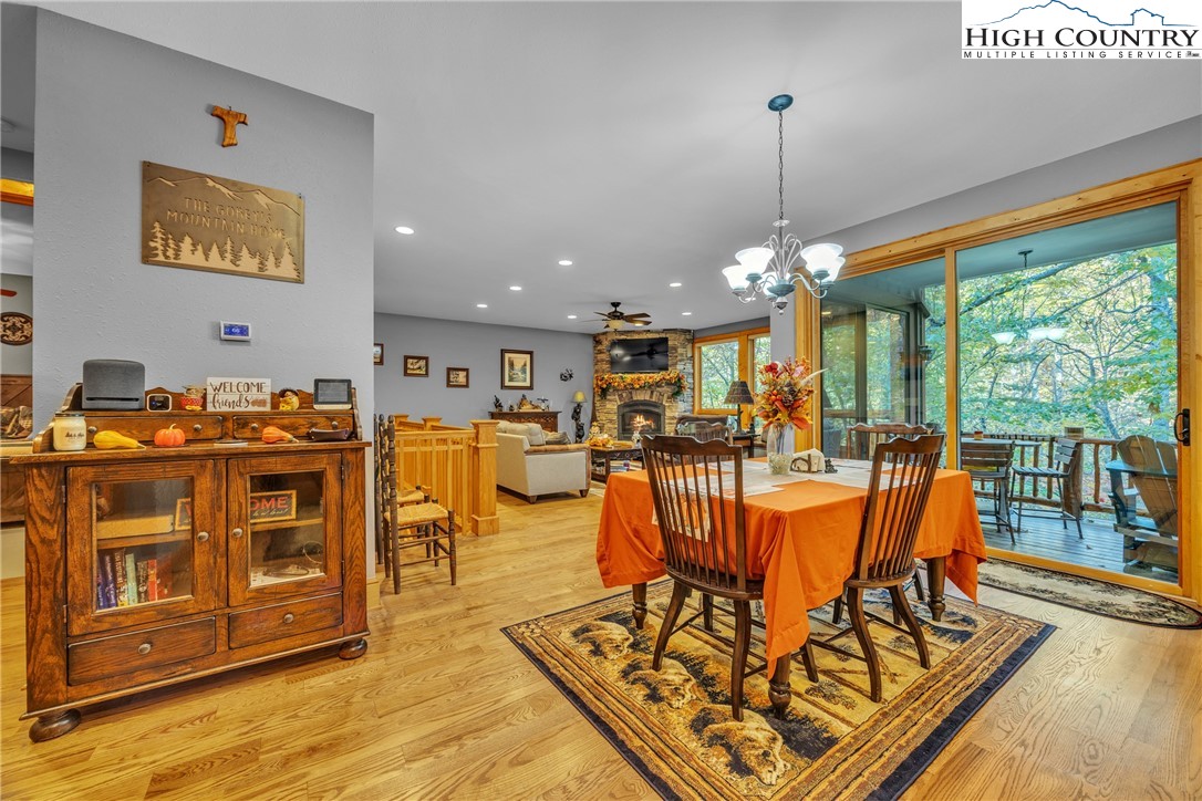 89 Springhouse Drive, Unit A4 Elk Park, NC 28622 - Photo 8 of 46 a view of a dining room with furniture water view and kitchen view