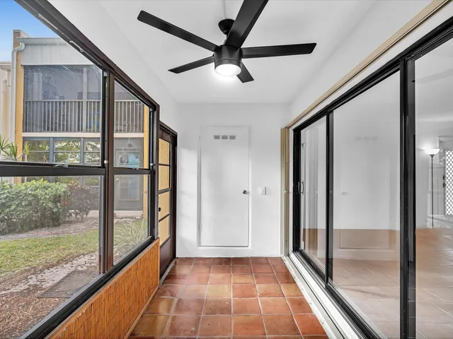 a view of a room with a large window