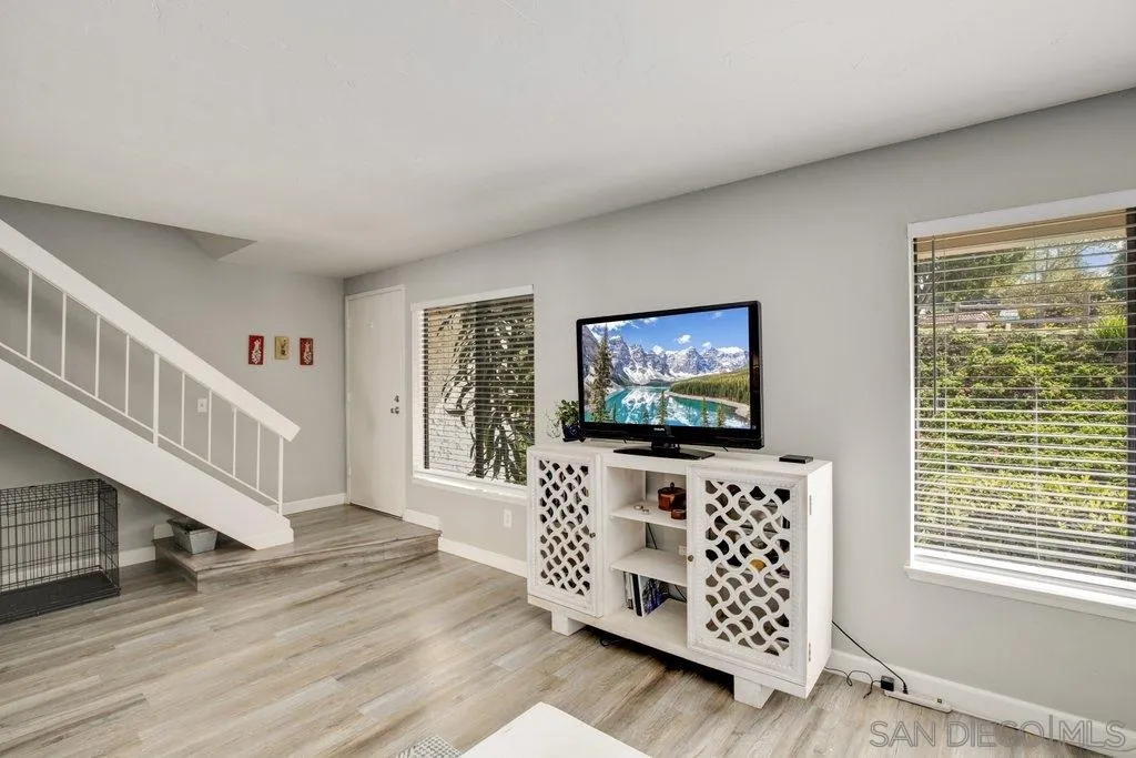 2807 Via Pajaro Carlsbad, CA 92010 - Photo 13 of 26 a living room with furniture and a flat screen tv