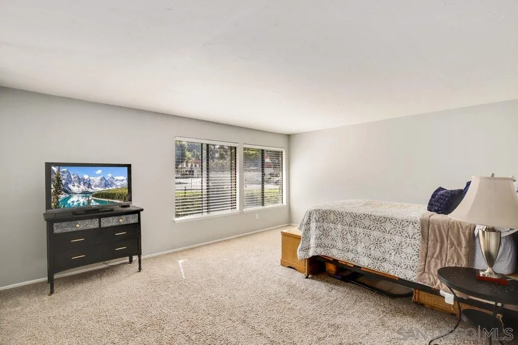 2807 Via Pajaro Carlsbad, CA 92010 - Photo 16 of 26 a bedroom with a bed and window