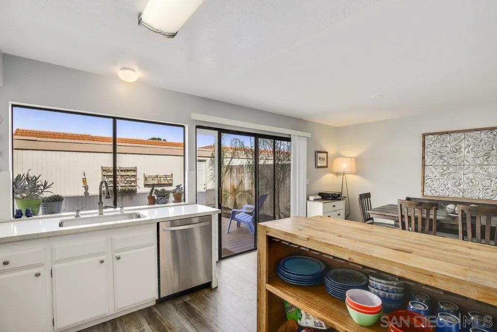 2807 Via Pajaro Carlsbad, CA 92010 - Photo 5 of 26 a large kitchen with kitchen island a large window