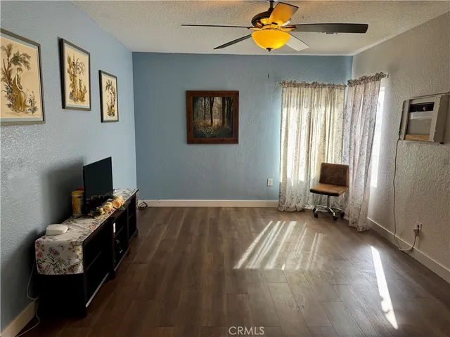 a room with furniture and a window
