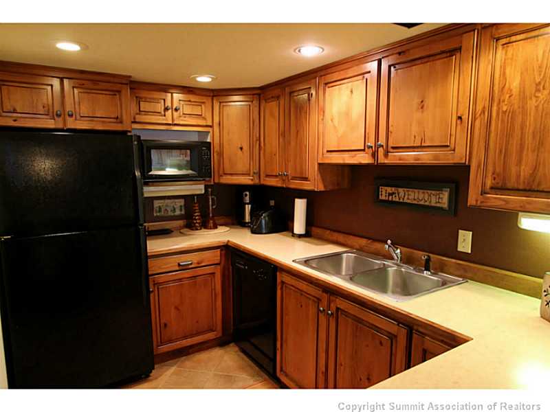 800 Copper Road, Unit 179 Frisco, CO 80443 - Photo 5 of 23 Kitchen. Cabinet upgrades and new recessed lighting