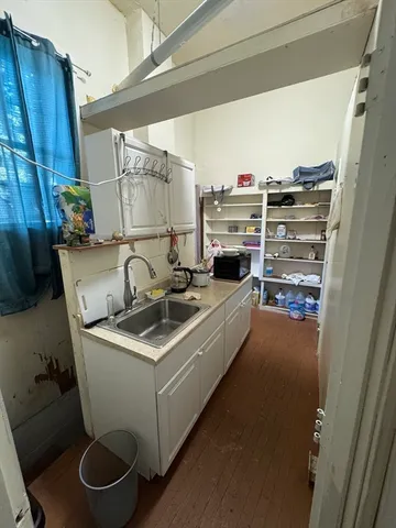 a utility room with washer and dryer
