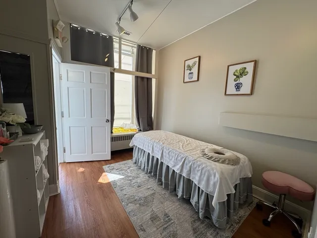 a bathroom with a sink and shower