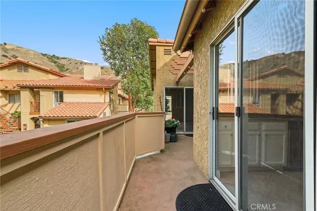 a view of a house with a balcony
