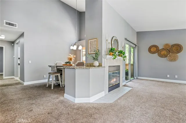 a view of a livingroom with furniture and window