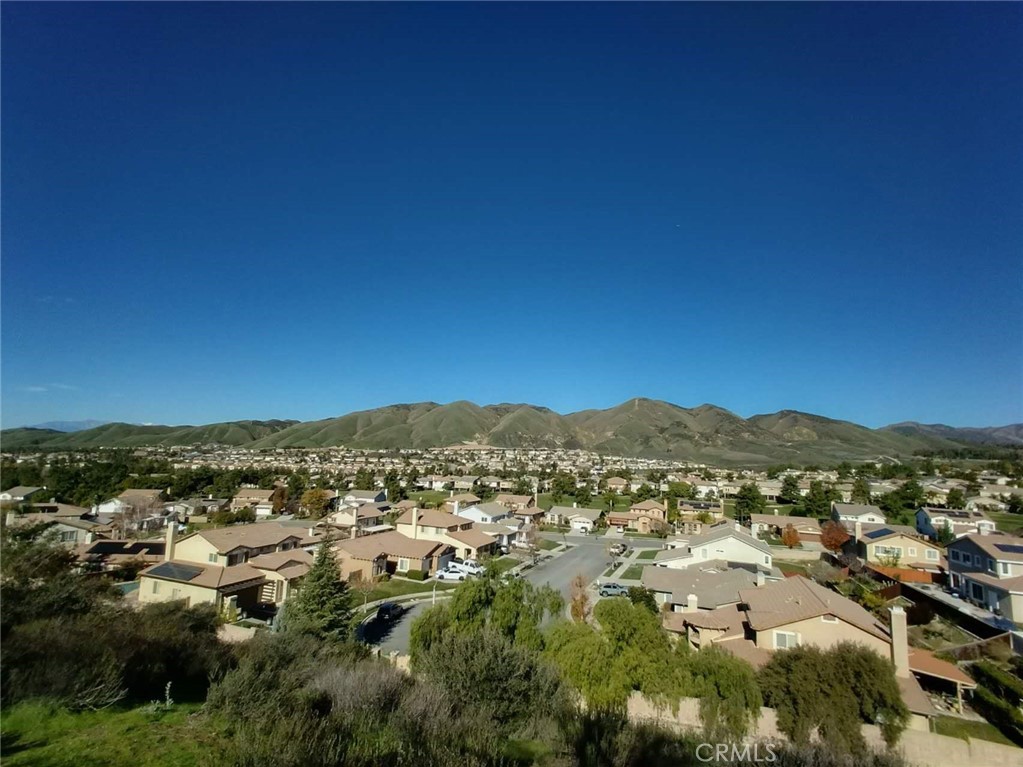 11811 Cramer Road Yucaipa, CA 92399 - Photo 20 of 22 an aerial view of residential houses with outdoor space and trees