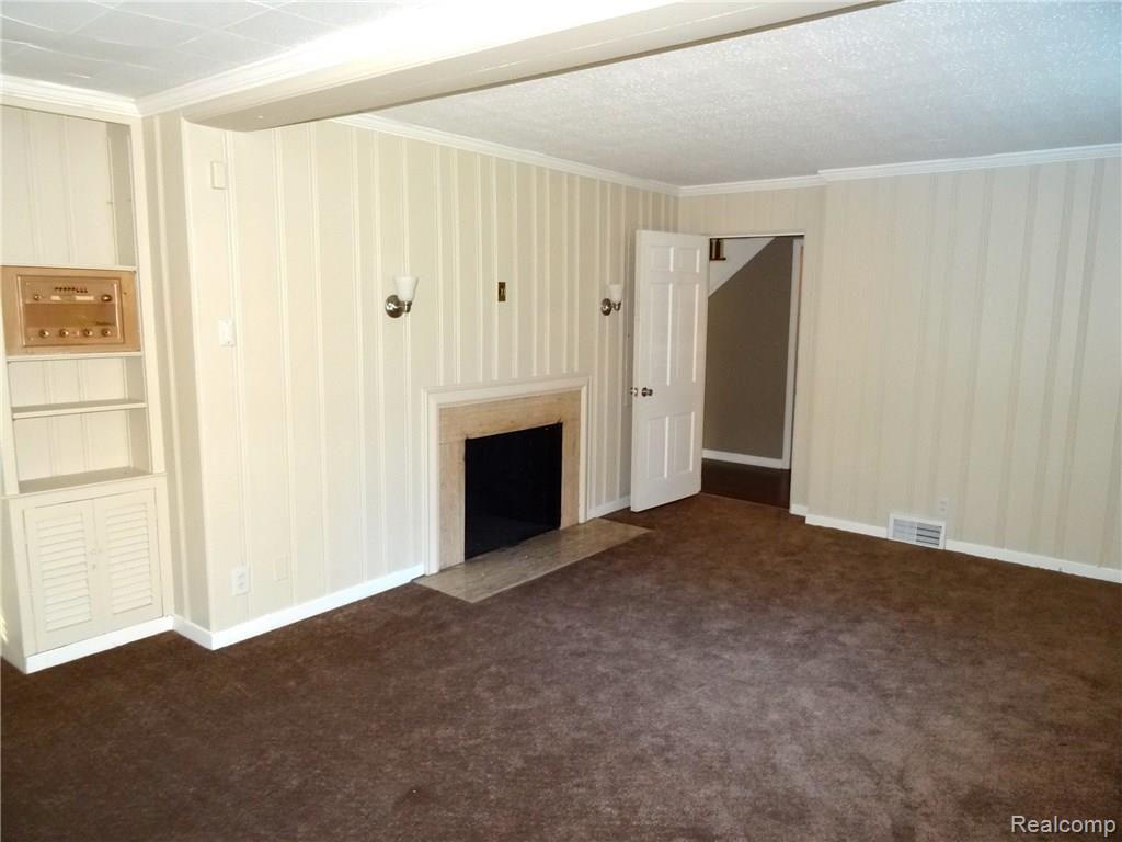 19800 Canterbury Road Detroit, MI 48221 - Photo 33 of 51 Family Fireplace.JPG