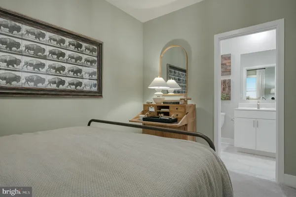 a room with a bed and gym equipment