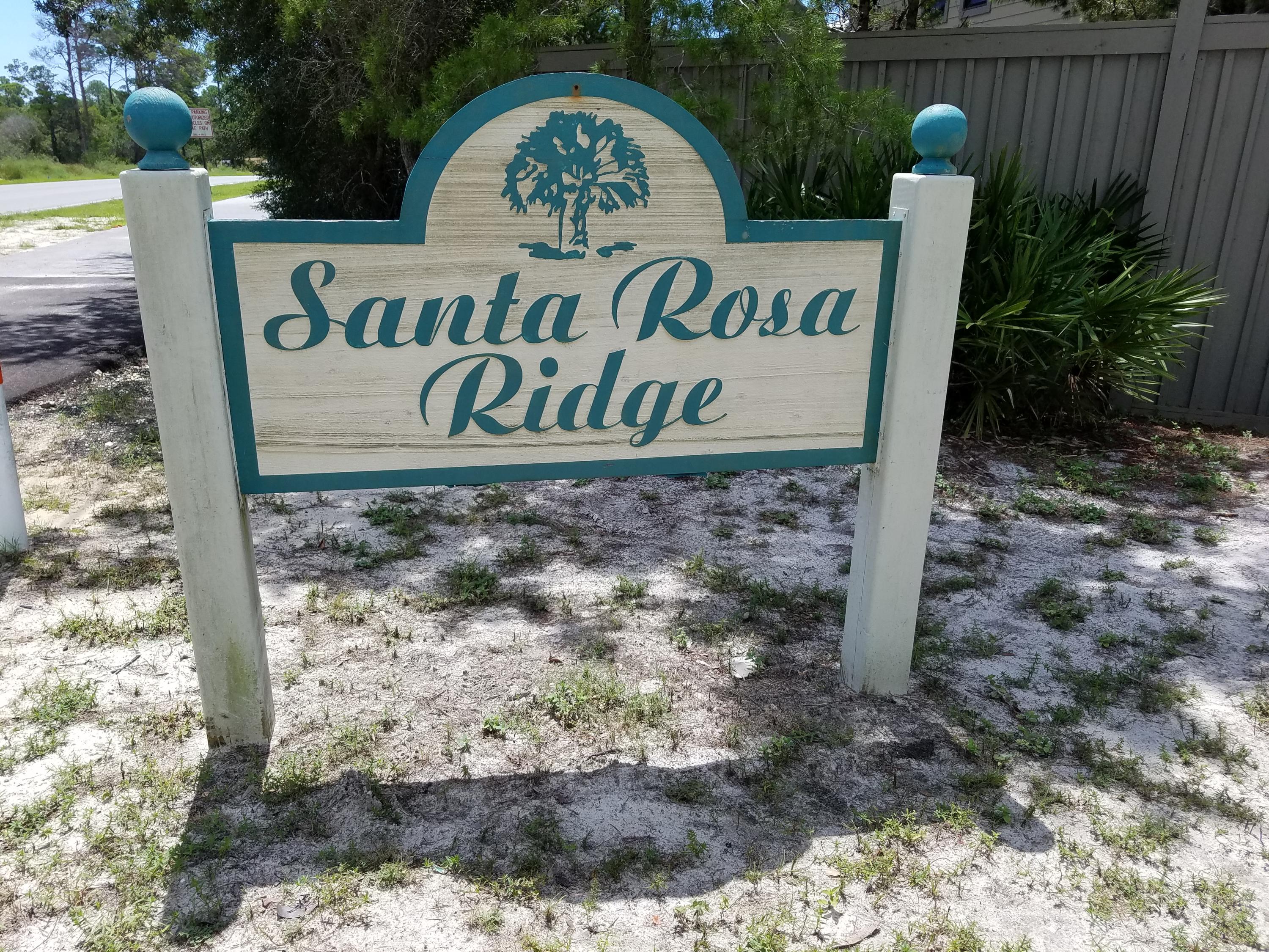 Lot 16 Ridge Road Santa Rosa Beach, FL 32459 - Photo 1 of 12 a sign broad in front of a yard