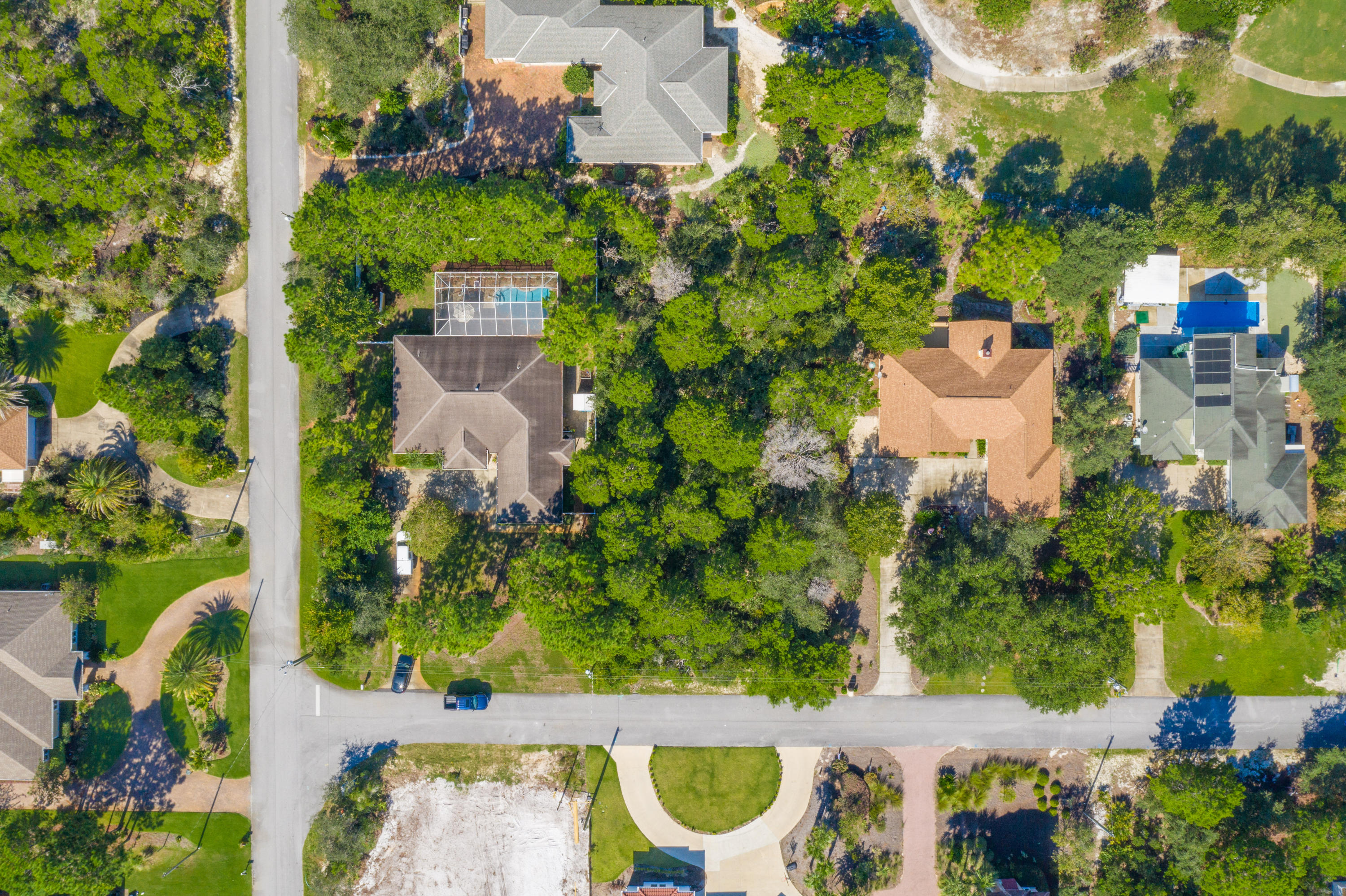 Lot 16 Ridge Road Santa Rosa Beach, FL 32459 - Photo 5 of 12 an aerial view of a house with a yard and lake view