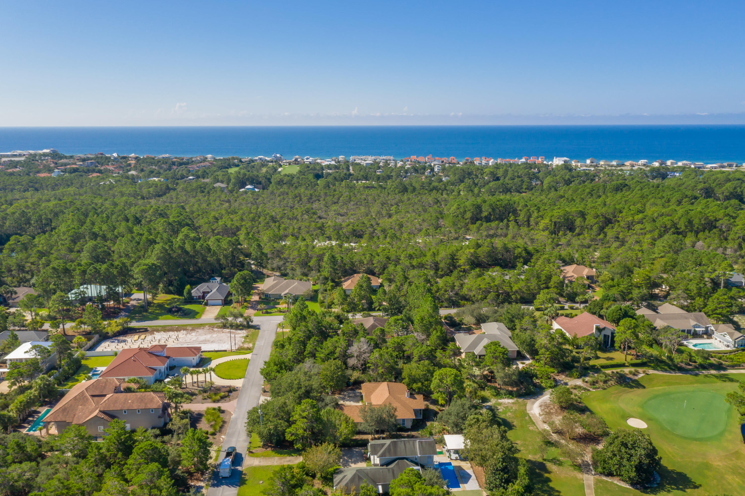 Lot 16 Ridge Road Santa Rosa Beach, FL 32459 - Photo 8 of 12 an aerial view of a city with lots of residential buildings and mountain view in back