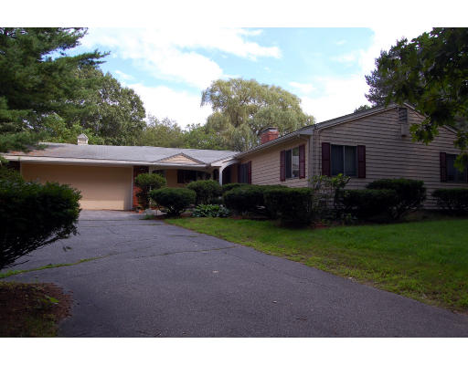 251 Highland Road Andover, MA 01810 - Photo 1 of 19 a front view of a house with garden