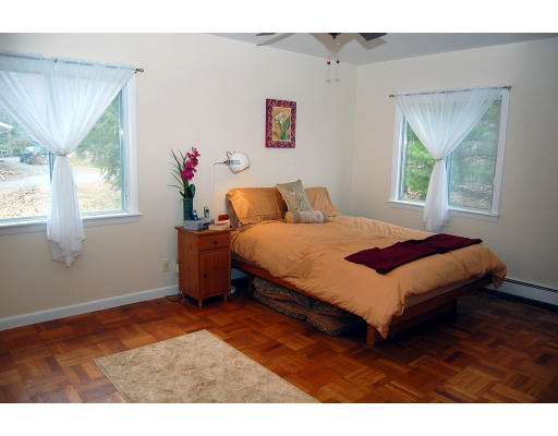 251 Highland Road Andover, MA 01810 - Photo 14 of 19 a bedroom with a bed and a window
