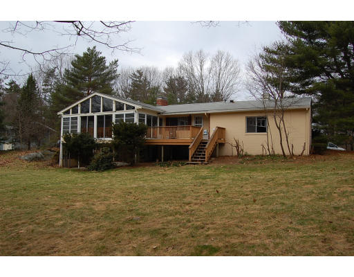 251 Highland Road Andover, MA 01810 - Photo 19 of 19 a front view of a house with garden