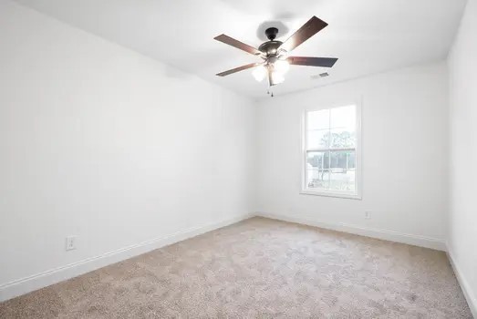 940 Britton Springs Road, Unit 203 Clarksville, TN 37042 - Photo 23 of 30 an empty room with a window and a fan