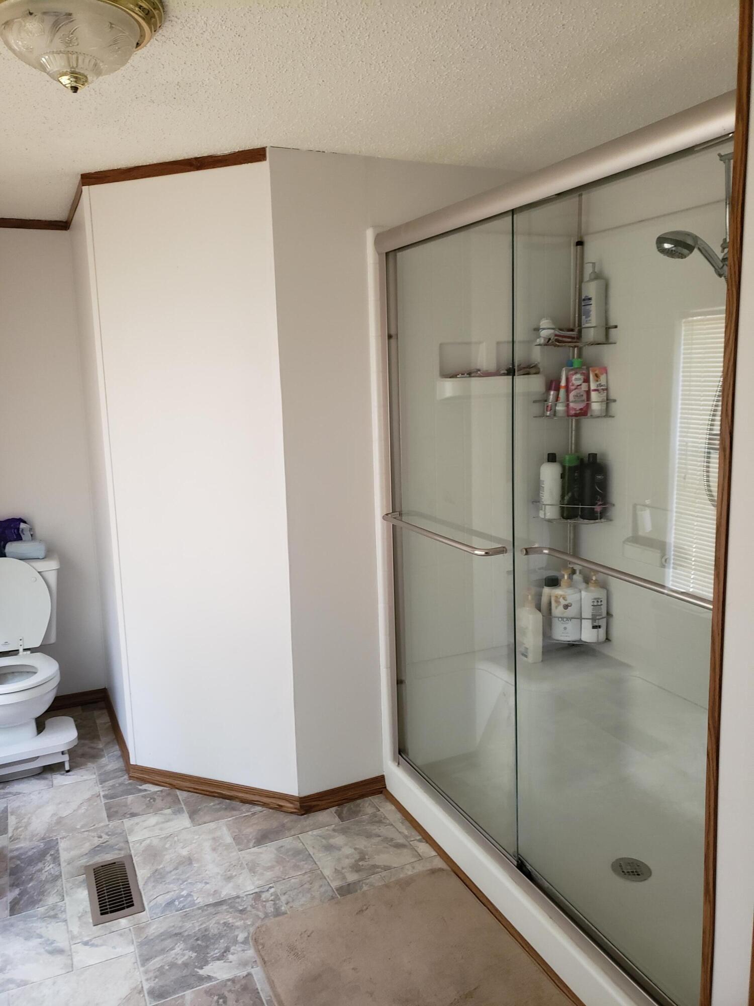 290 Beck Bridge Road Westville, FL 32464 - Photo 11 of 13 a bathroom with a shower