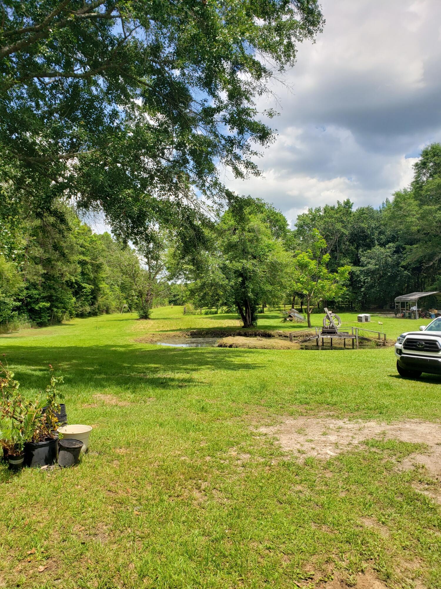 290 Beck Bridge Road Westville, FL 32464 - Photo 5 of 13 a view of a lake with a yard