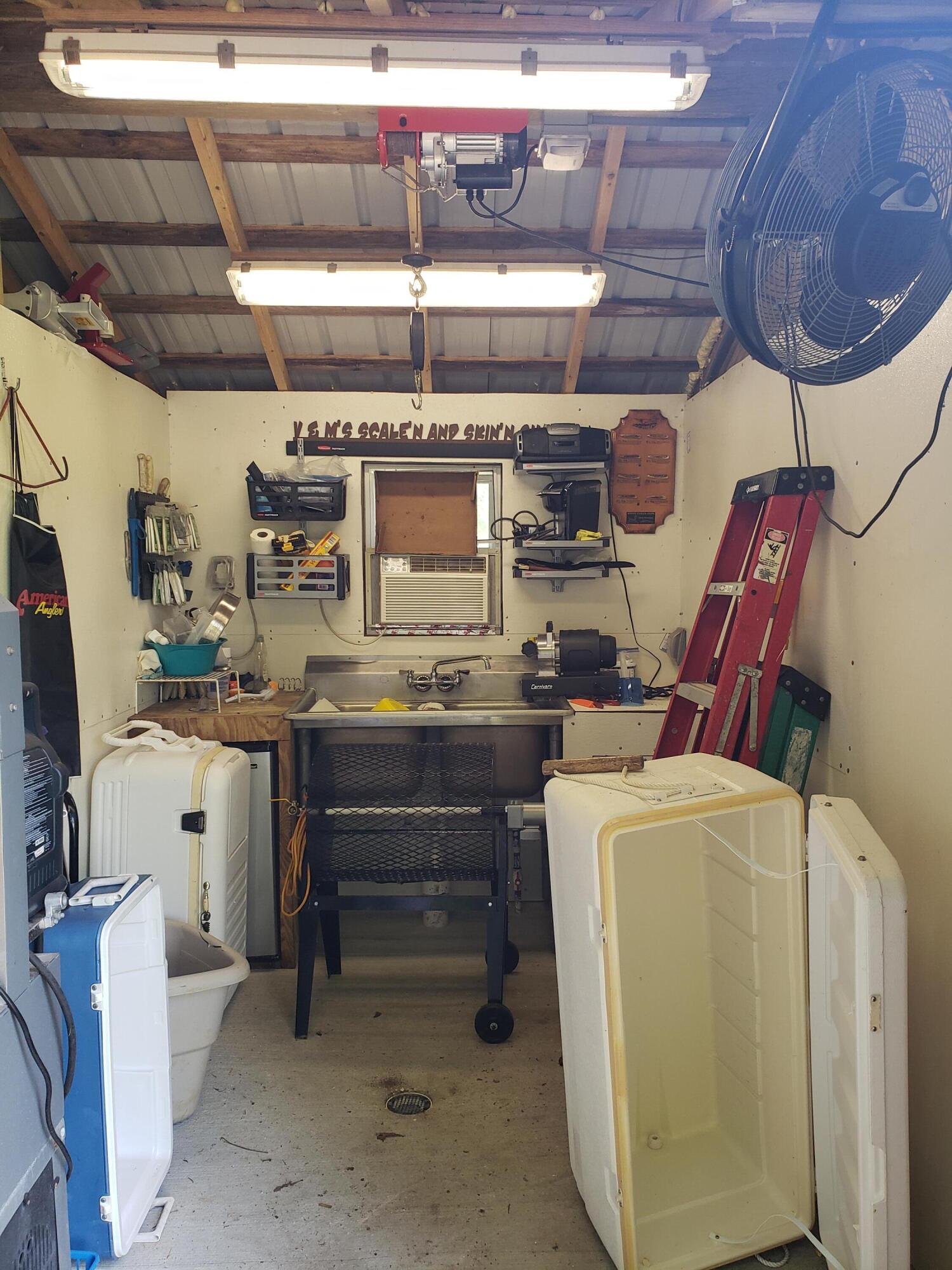 290 Beck Bridge Road Westville, FL 32464 - Photo 7 of 13 a room with storage and utility room