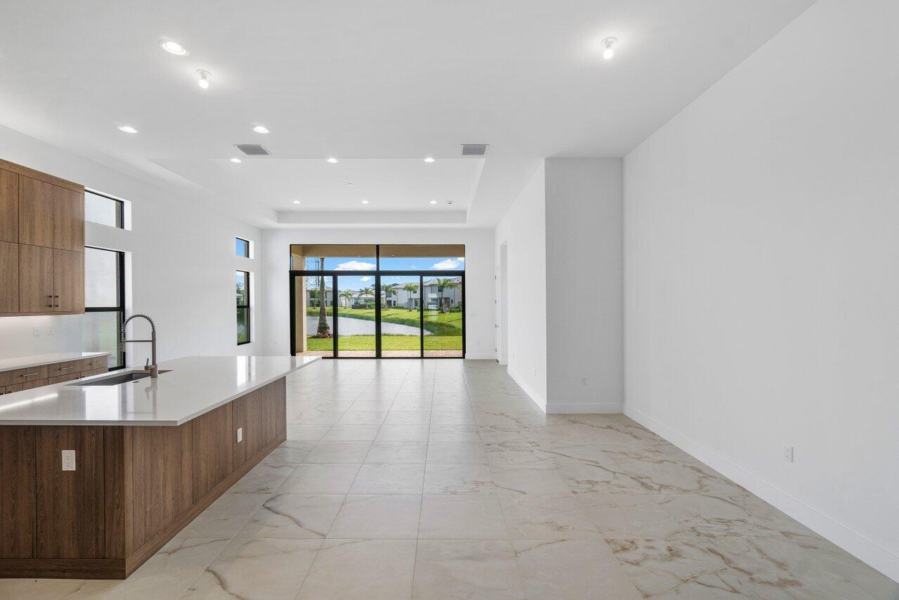 8254 Royal County Down Road Boca Raton, FL 33434 - Photo 11 of 12 great room/dining room