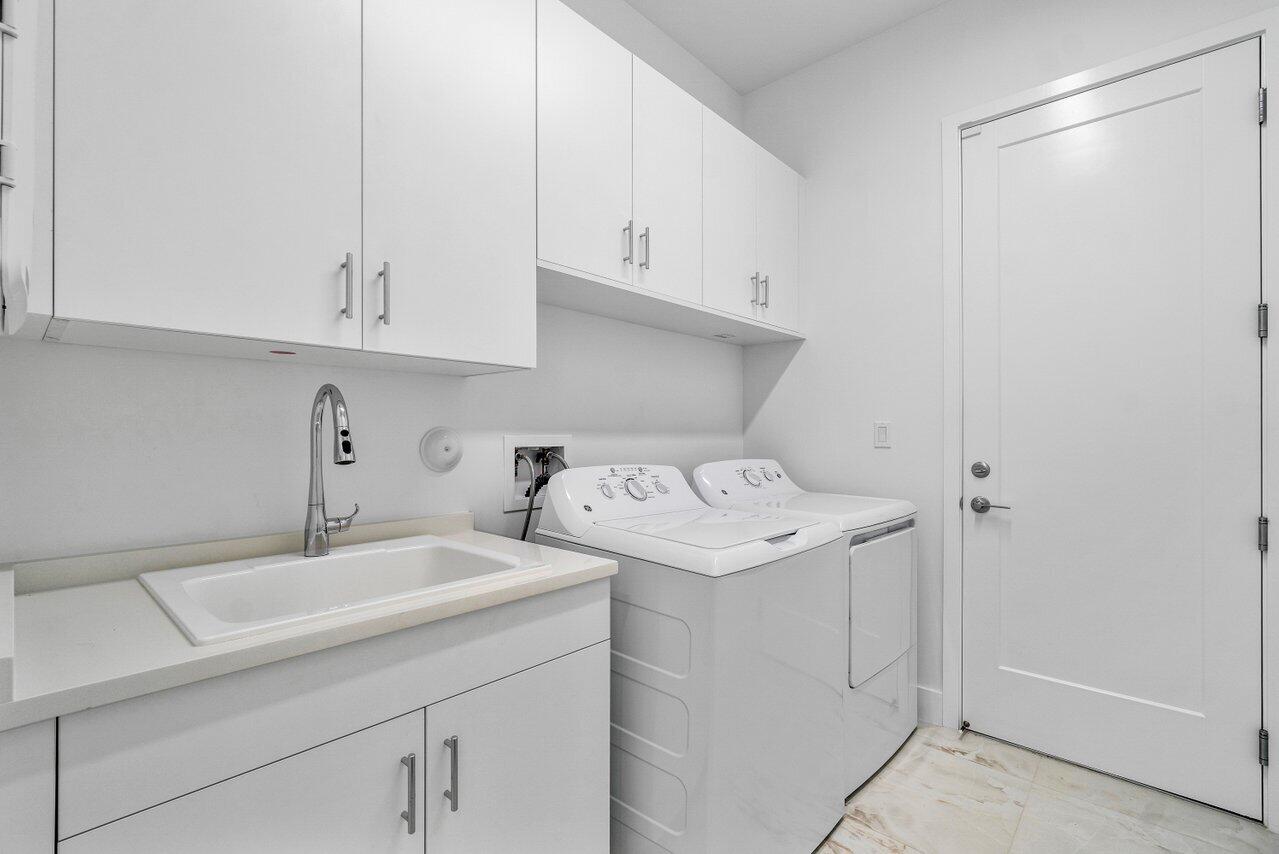 8254 Royal County Down Road Boca Raton, FL 33434 - Photo 12 of 12 laundry room