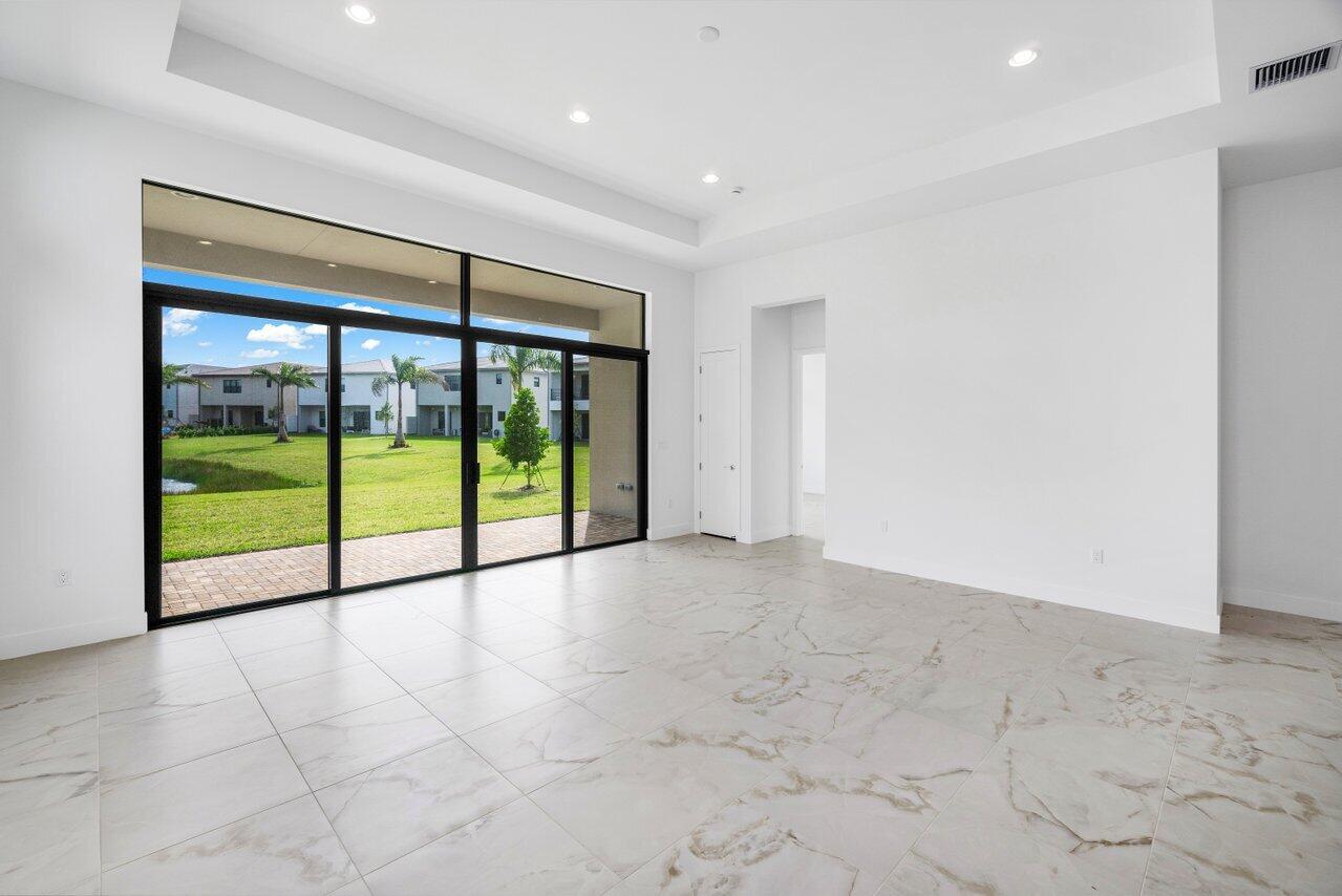 8254 Royal County Down Road Boca Raton, FL 33434 - Photo 8 of 12 great room/dining room