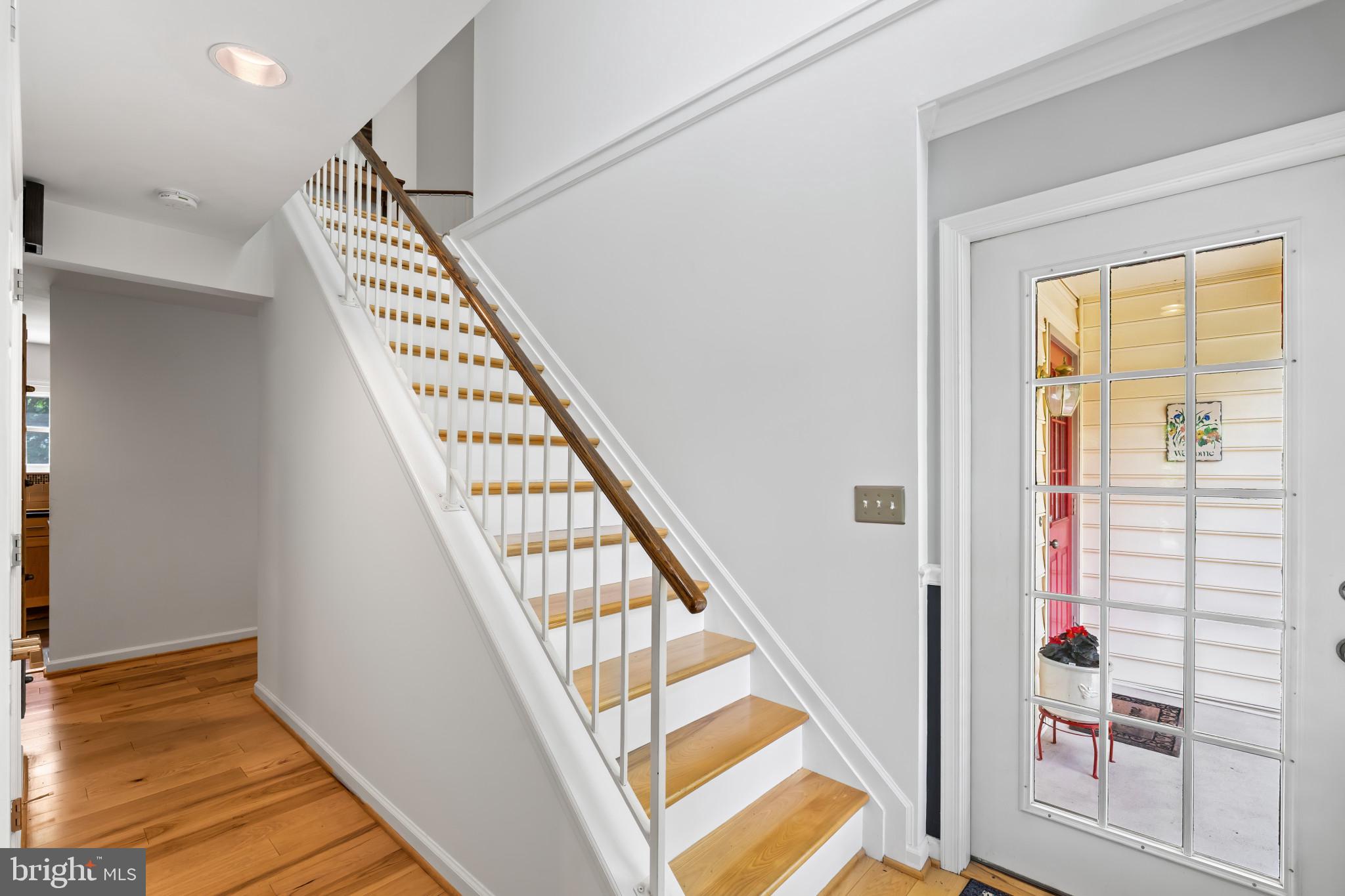10821 Braeburn Road Columbia, MD 21044 - Photo 33 of 64 a view of an entryway with staircase