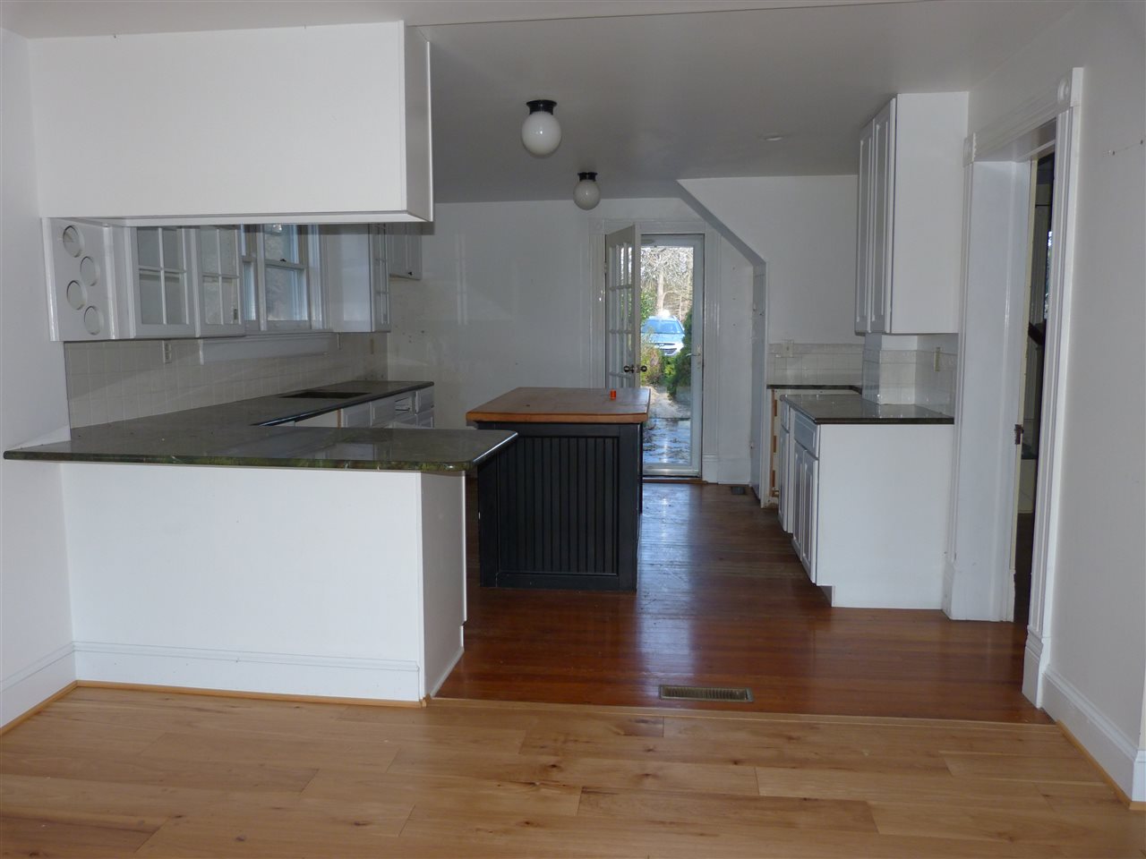 699 Roman Road Mount Sidney, VA 24467 - Photo 11 of 18 a kitchen with a refrigerator and a stove top oven