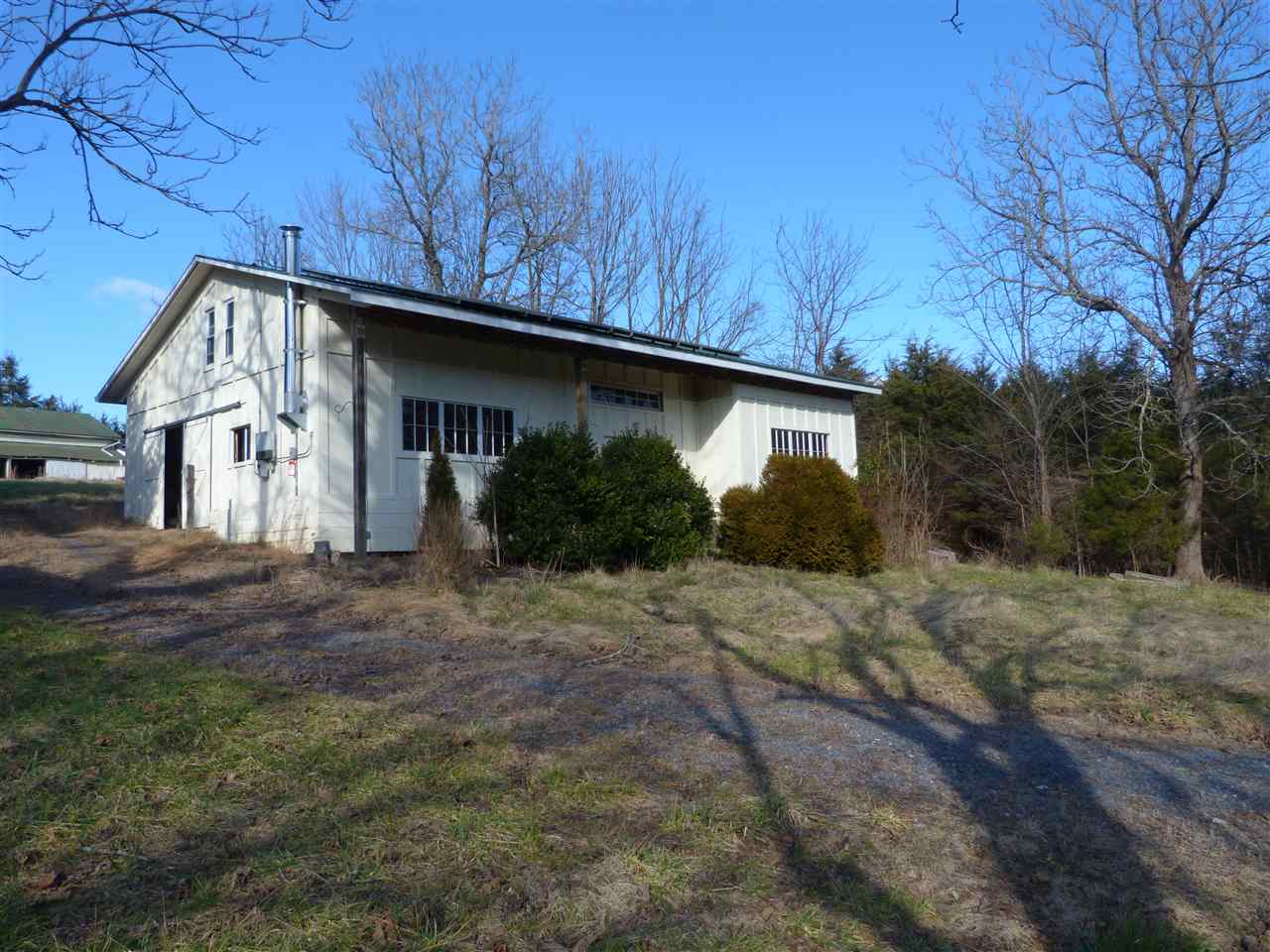 699 Roman Road Mount Sidney, VA 24467 - Photo 14 of 18 a house with trees in the background