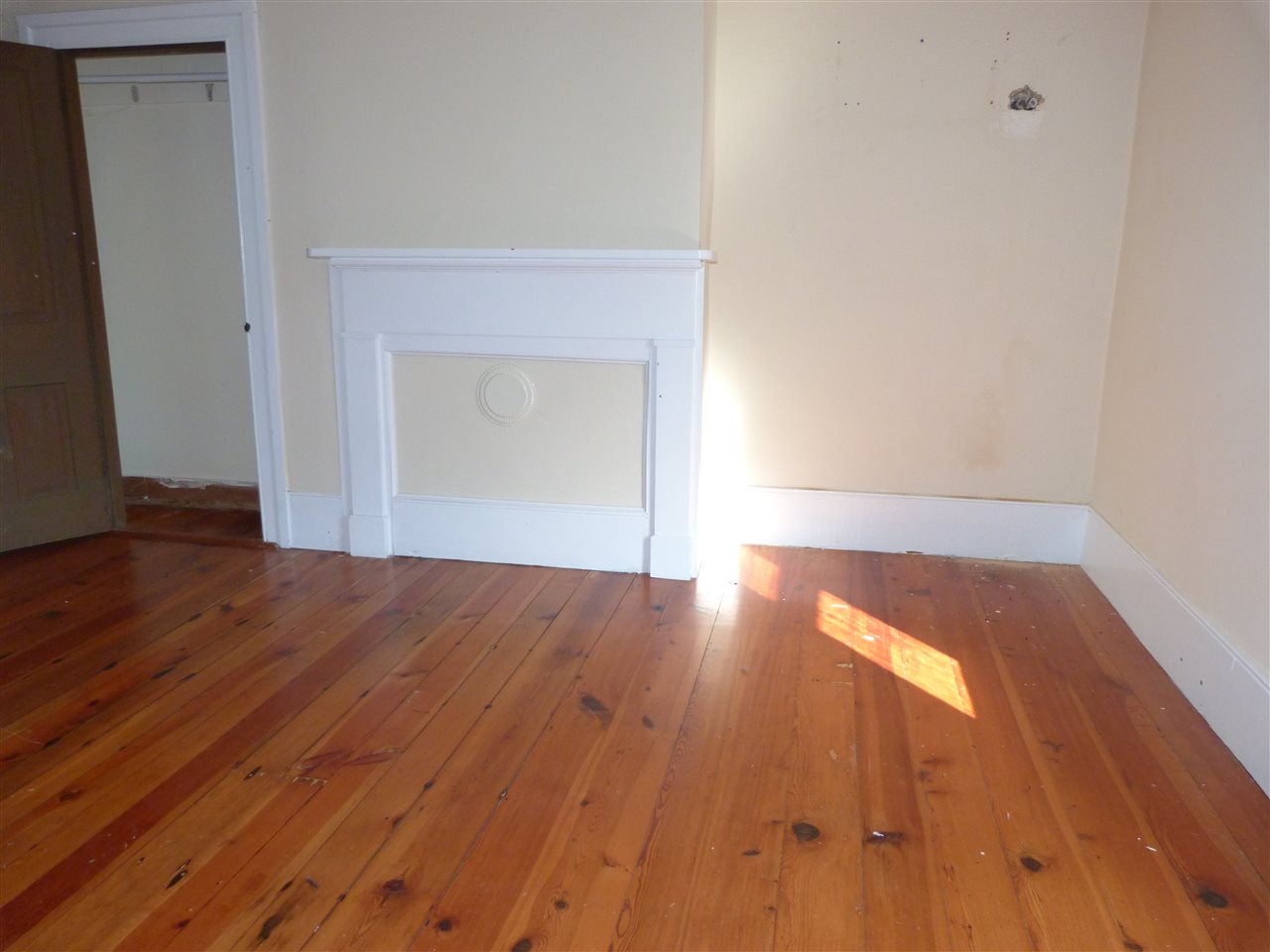 699 Roman Road Mount Sidney, VA 24467 - Photo 9 of 18 an empty room with wooden floor and closet