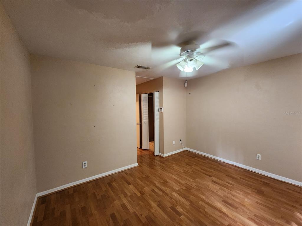 6288 Southwest 8th Place Gainesville, FL 32607 - Photo 15 of 21 a view of an empty room with a window