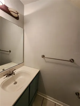 a bathroom with a sink and shower
