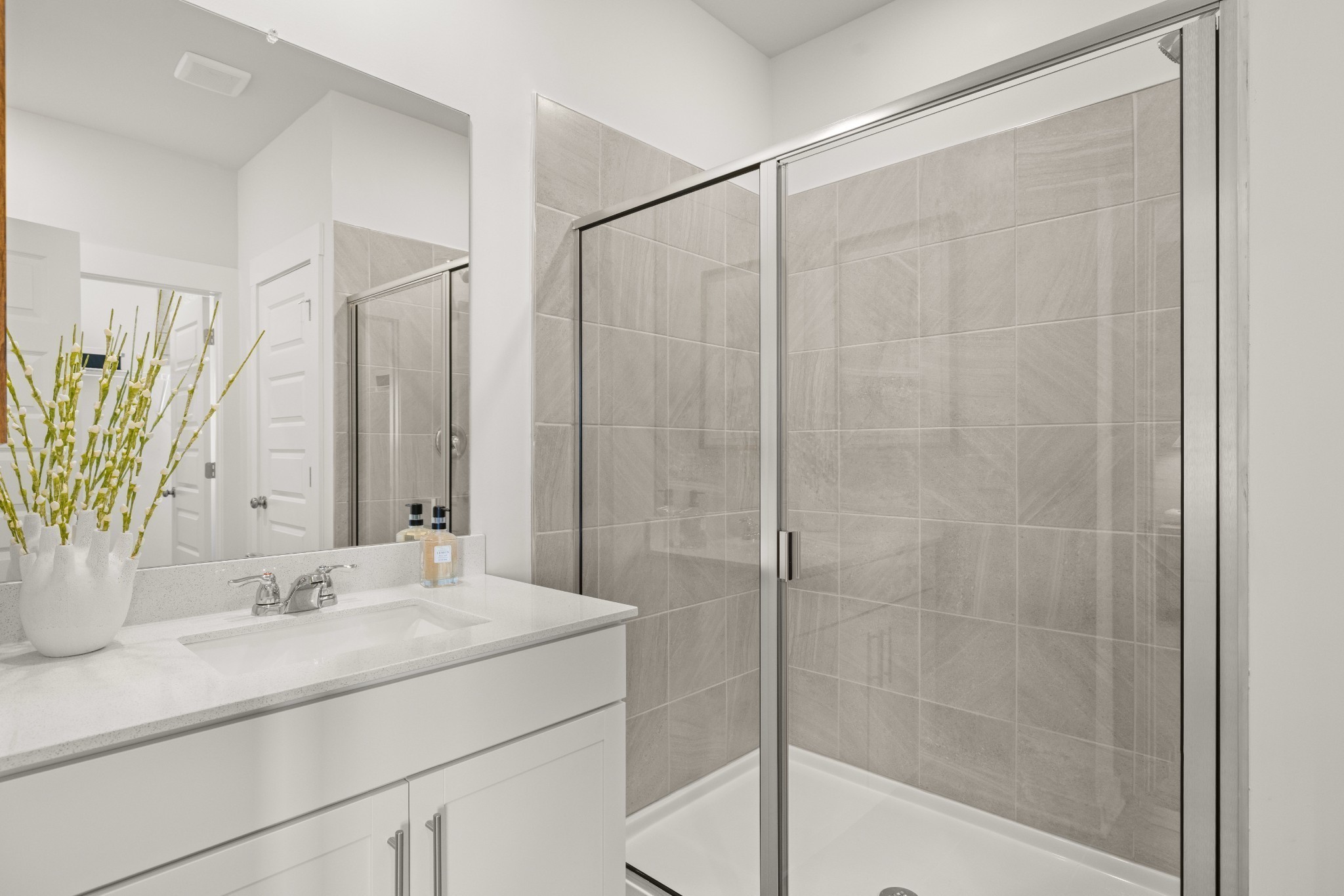 500 Hinton Street Lebanon, TN 37090 - Photo 42 of 67 a bathroom with a shower sink and mirror