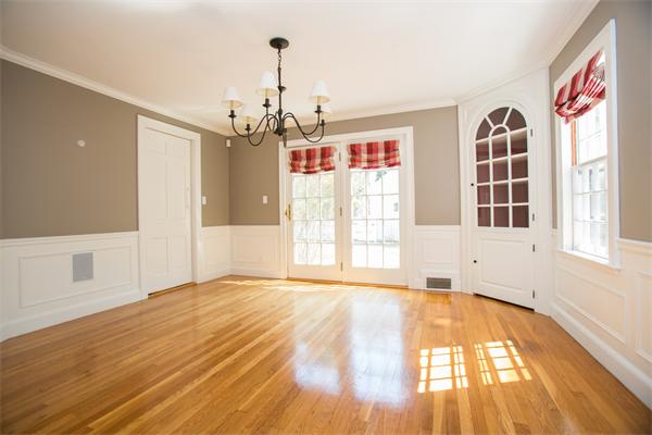 25 Oxbow Road Wellesley, MA 02481 - Photo 5 of 14 a view of an empty room with window and wooden floor