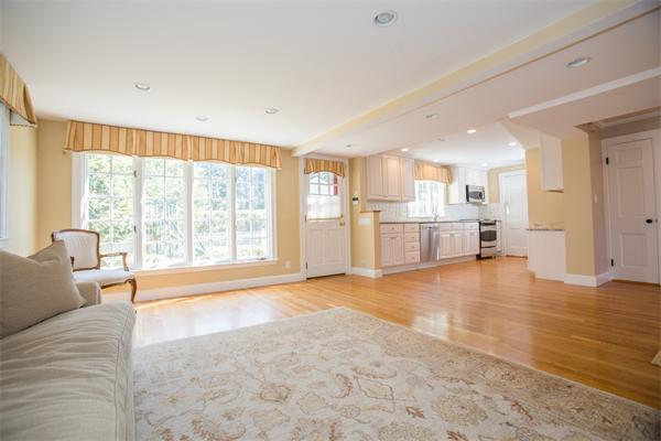 25 Oxbow Road Wellesley, MA 02481 - Photo 6 of 14 a large bedroom with a large bed and wooden floor