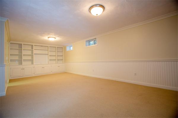 25 Oxbow Road Wellesley, MA 02481 - Photo 9 of 14 an empty room with a empty space and empty shelves